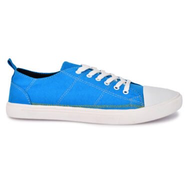 A stylish blue sneaker with a canvas upper, white laces, and a white rubber sole, perfect for casual wear and street-style fashion