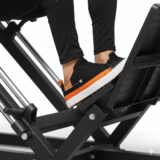 Close-up of a man performing a leg press wearing Bebuddy canvas shoes in black, offering grip, balance, and comfort for men | focusonstyle.in